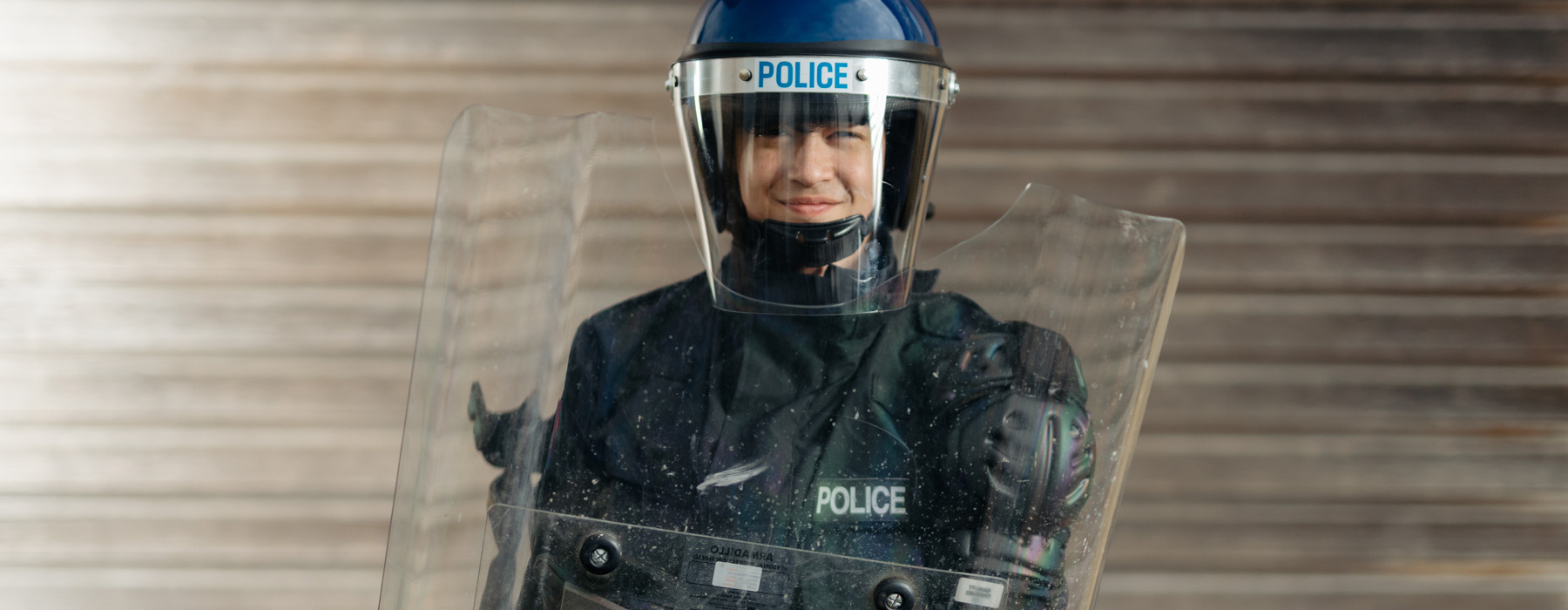Public serv banner Public Services student in Humberside Police riot gear uniform