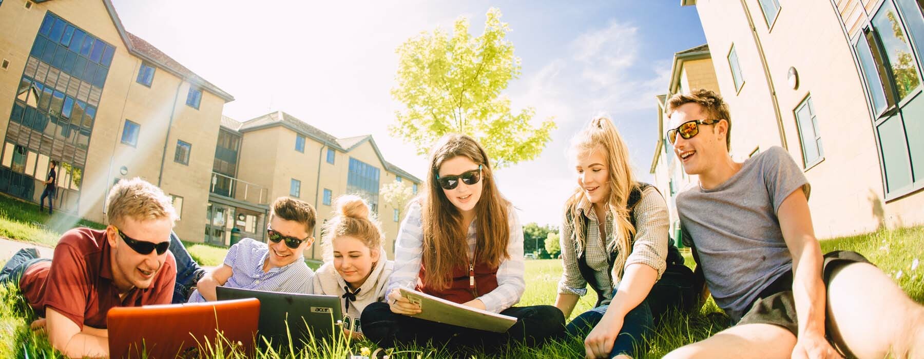 Students socialise outside accommodation at University Centre Bishop Burton