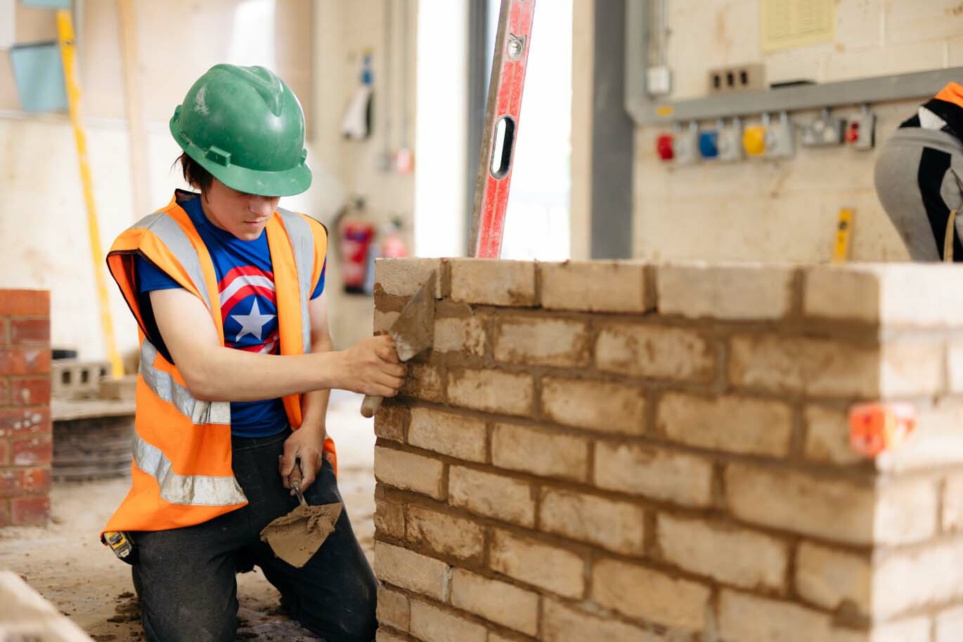 14 16 image 1 Construction student bricklaying