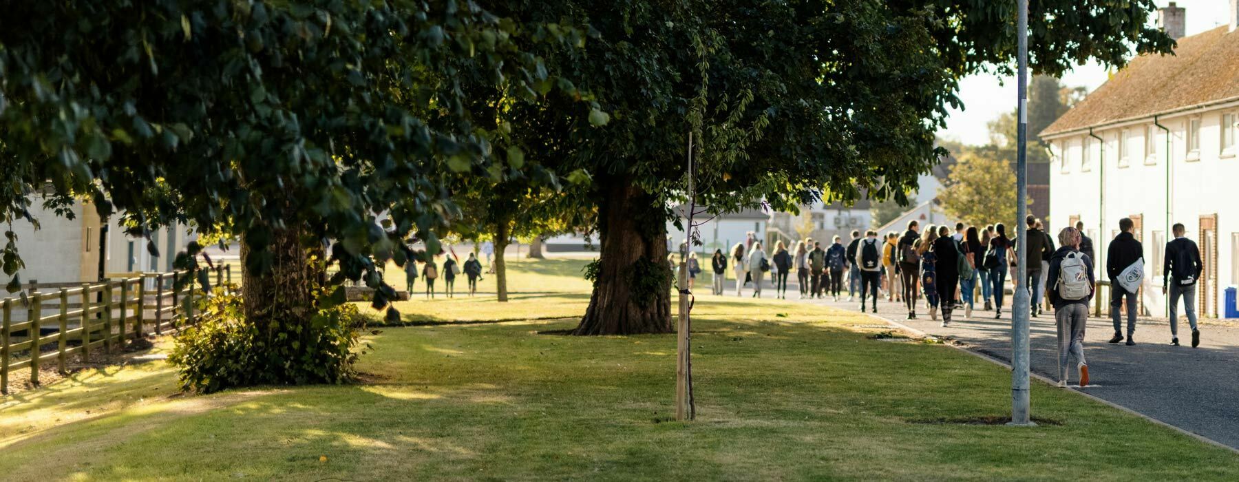 Getting here banner Students walk onto campus at Bishop Burton College